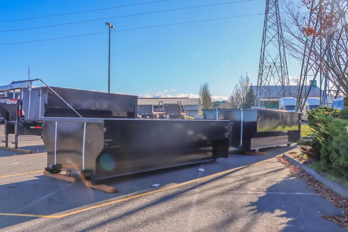 Roll-off dumpster ready for waste disposal at job site for 3 Yard Dumpster Rental in Dunn Loring
